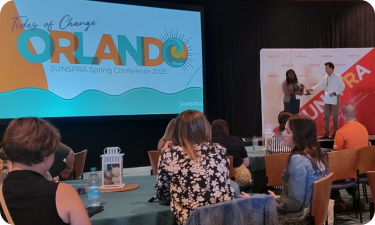 Attendees view the speakers at the 2025 SUNSPRA conference